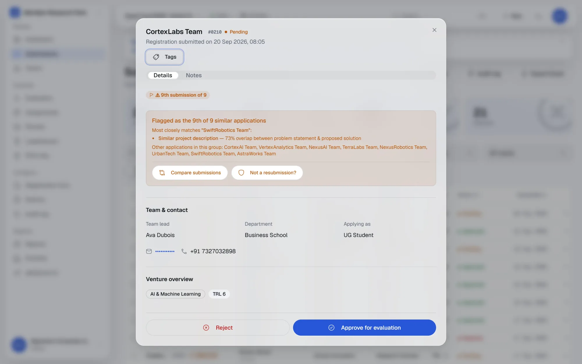 The submission dossier for a team, showing the resubmission-lineage banner, team and contact details and the venture overview.